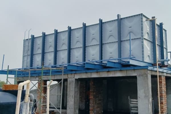 NEERCO GRP/SMC panel water tank installed on a rooftop